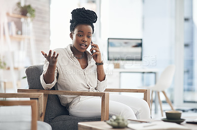 Buy stock photo Shot of a young businesswoman using her smartphone to make phone calls at the office