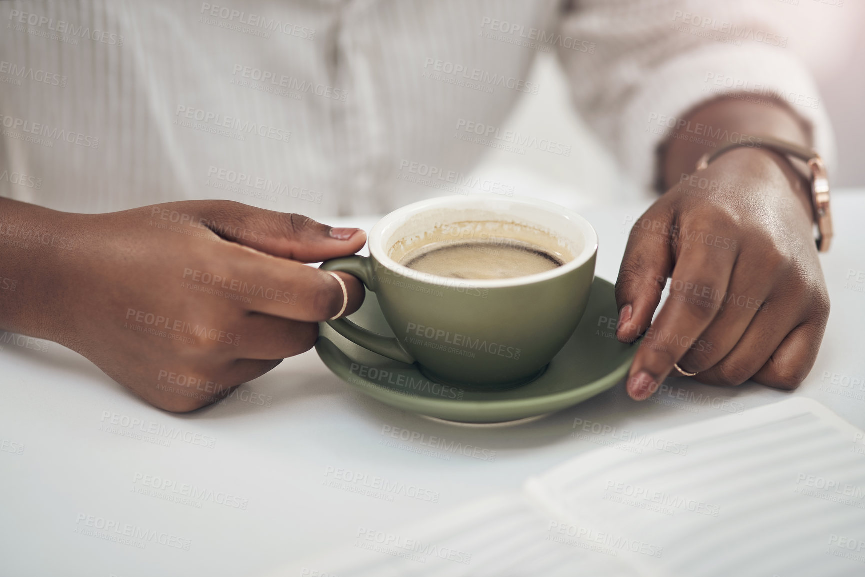 Buy stock photo Shot of a businesswoman enjoying a cup of coffee at work