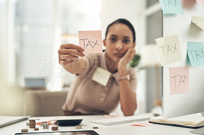 Buy stock photo Shot of a young businesswoman holding a note with 