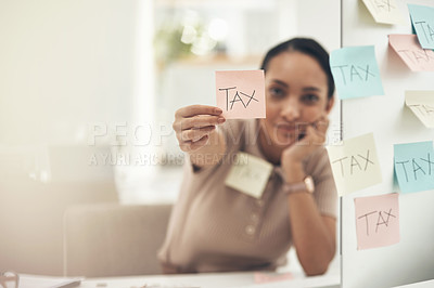 Buy stock photo Shot of a young businesswoman holding a note with 