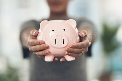 Buy stock photo Closeup shot of an unrecognisable businesswoman holding a piggybank