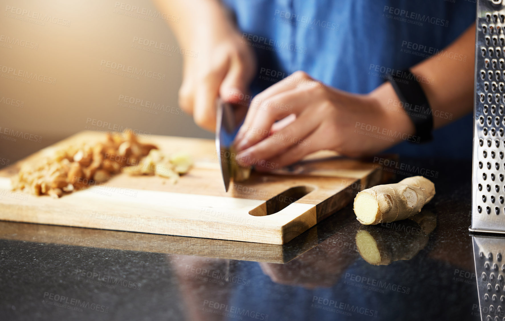 Buy stock photo Shot of an unrecognisable woman preparing a healthy meal at home
