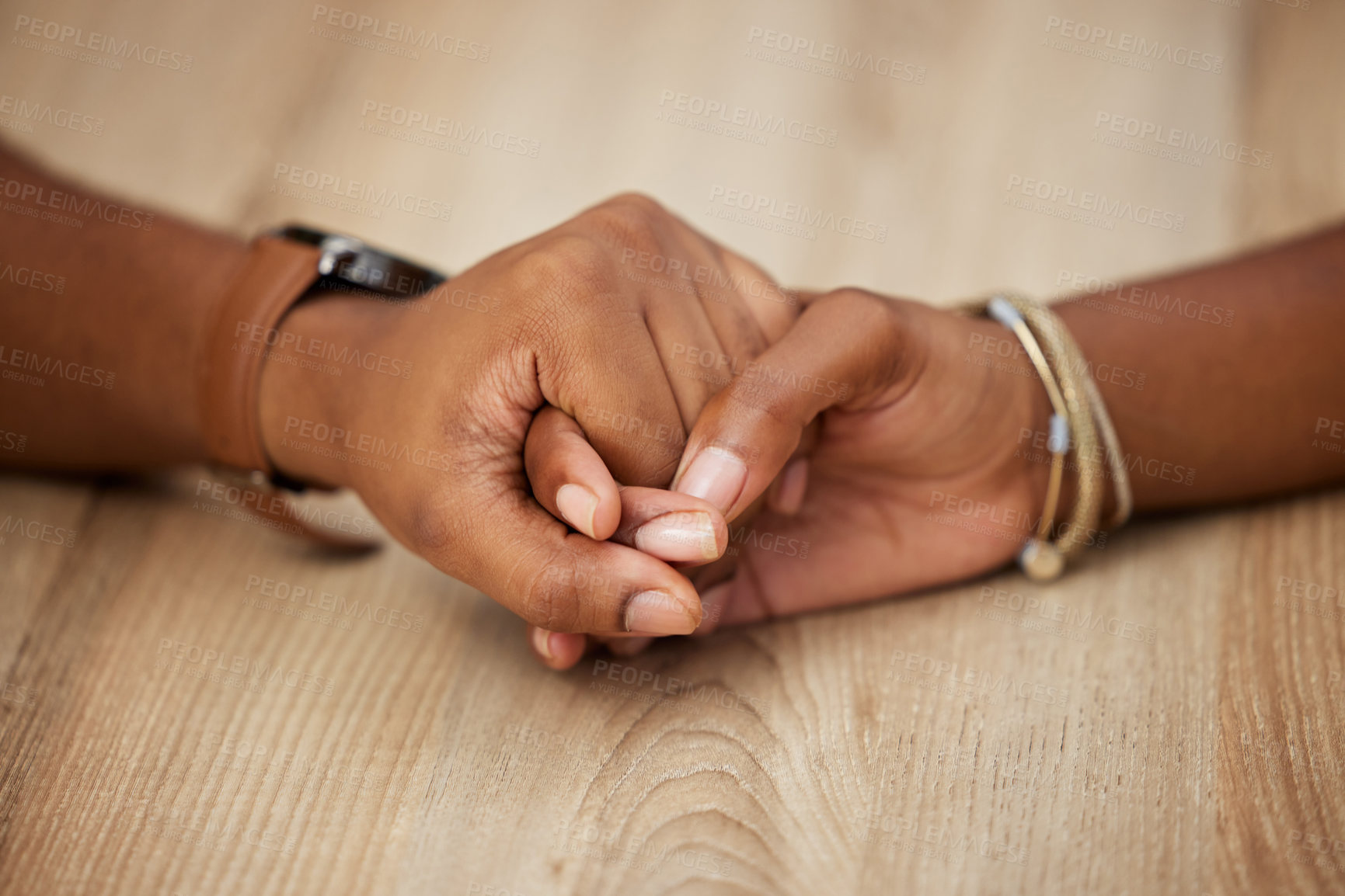 Buy stock photo Shot of two unrecognizable people holding hands at home