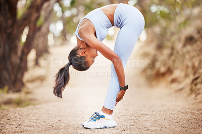 Buy stock photo Health, fitness and woman stretching body in park for running, training or morning cardio in nature. Wellness, exercise and female runner in forest for workout, performance or resilience challenge