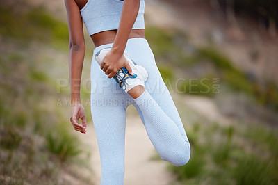 Buy stock photo Fitness, woman and leg for stretching in nature before training, jog or exercise outdoors. Runner, athlete girl and warm up for workout goal with sports for running, wellness or marathon competition