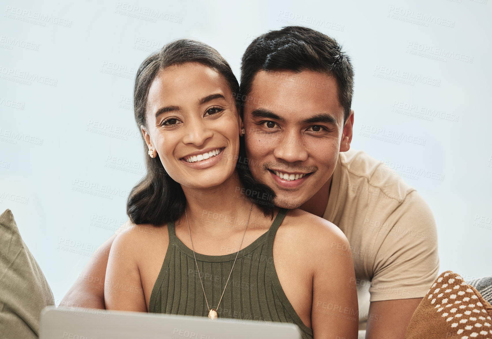 Buy stock photo Shot of a couple holding each other at home
