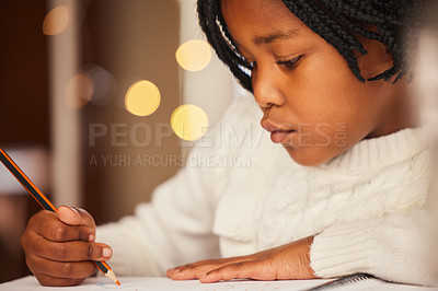 Buy stock photo African child, drawing and home with notebook, growth and development of kid, artist and learning of art. Creative, education and girl in house, table and pencil with color, talent and youth on desk