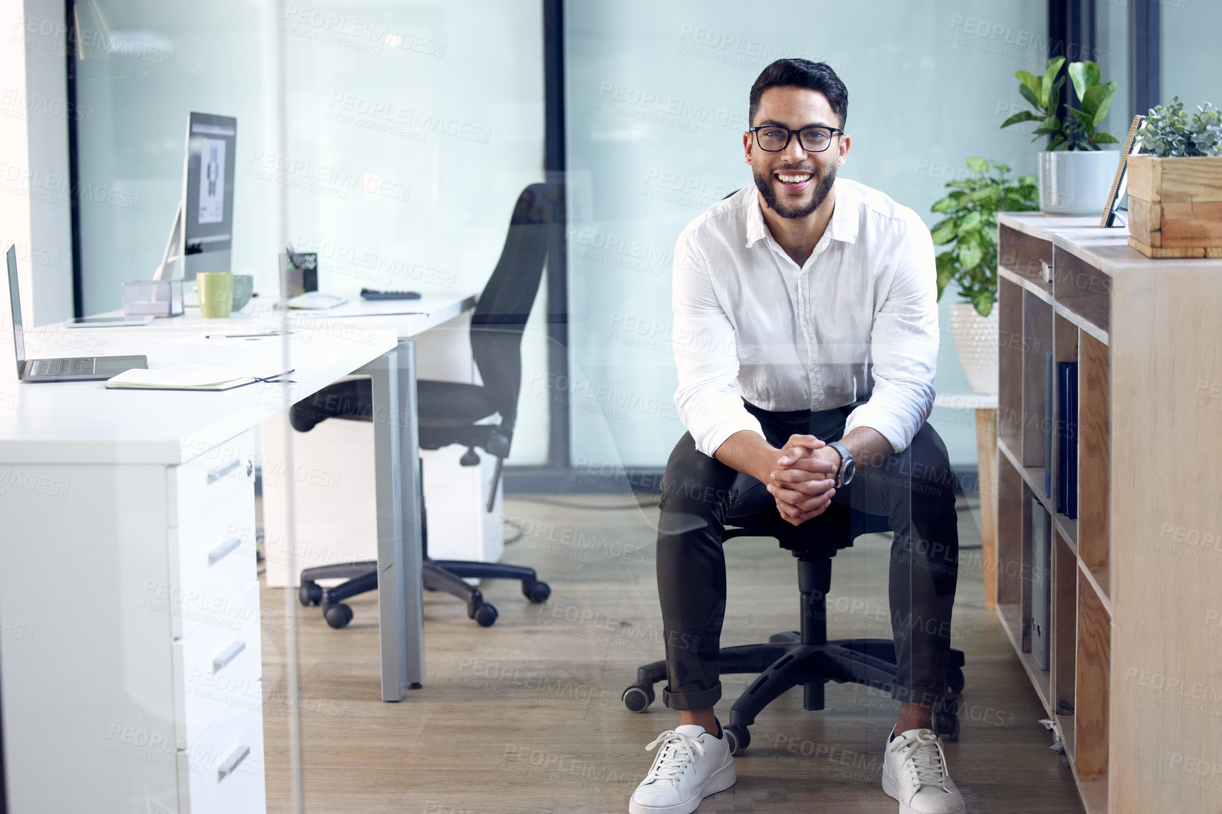 Buy stock photo Portrait, smile and business man in office, company and workplace of confident male person in Saudi Arabia. Happy, professional consultant and employee, entrepreneur or worker with glasses for career