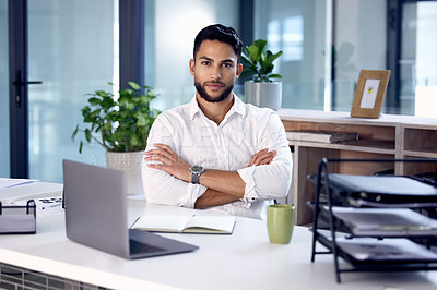 Buy stock photo Portrait, laptop and man with arms crossed, business and employee in a modern office, serious and startup success. Face, male person and entrepreneur with a pc, career and professional in a workplace