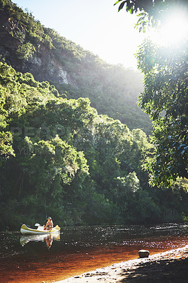 Buy stock photo Shot of a young woman out kayaking on a lake