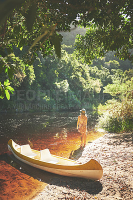 Buy stock photo Shot of a young woman out by the lake