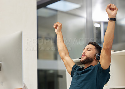 Buy stock photo Shot of a young businessman looking cheerful while working in a call center