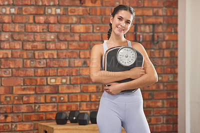 Buy stock photo Woman with scale, fitness and lose weight with exercise in gym, smile in portrait with health and mockup space. Female person in workout studio, weightloss and diet with healthy and active lifestyle
