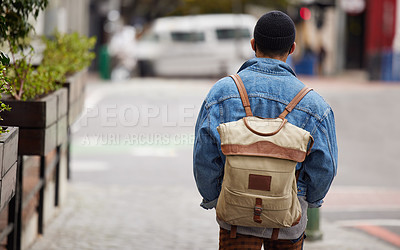 Buy stock photo Outdoor, walking and travel of student with backpack in city for education, adventure and journey to class. College, learning and man with bag at campus for scholarship, knowledge and development