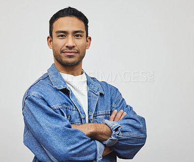 Buy stock photo Confidence, man and portrait with arms crossed, fashion and modern style in a studio with smile. Trendy, denim and cool outfit and proud from classic casual clothes with jacket and grey background