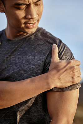 Buy stock photo Man, exercise and shoulder pain while outdoor with joint pressure, inflammation or injury. Male person, hand and accident as runner or hiking bruise with tendons strain for fitness, workout or muscle