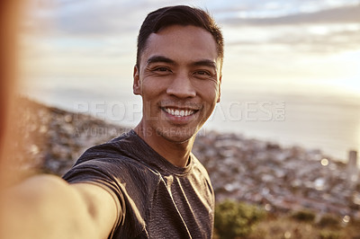 Buy stock photo Fitness, selfie and portrait of a man on a mountain running for race, marathon or competition training. Sports, workout and happy male runner athlete taking a picture doing an outdoor cardio exercise