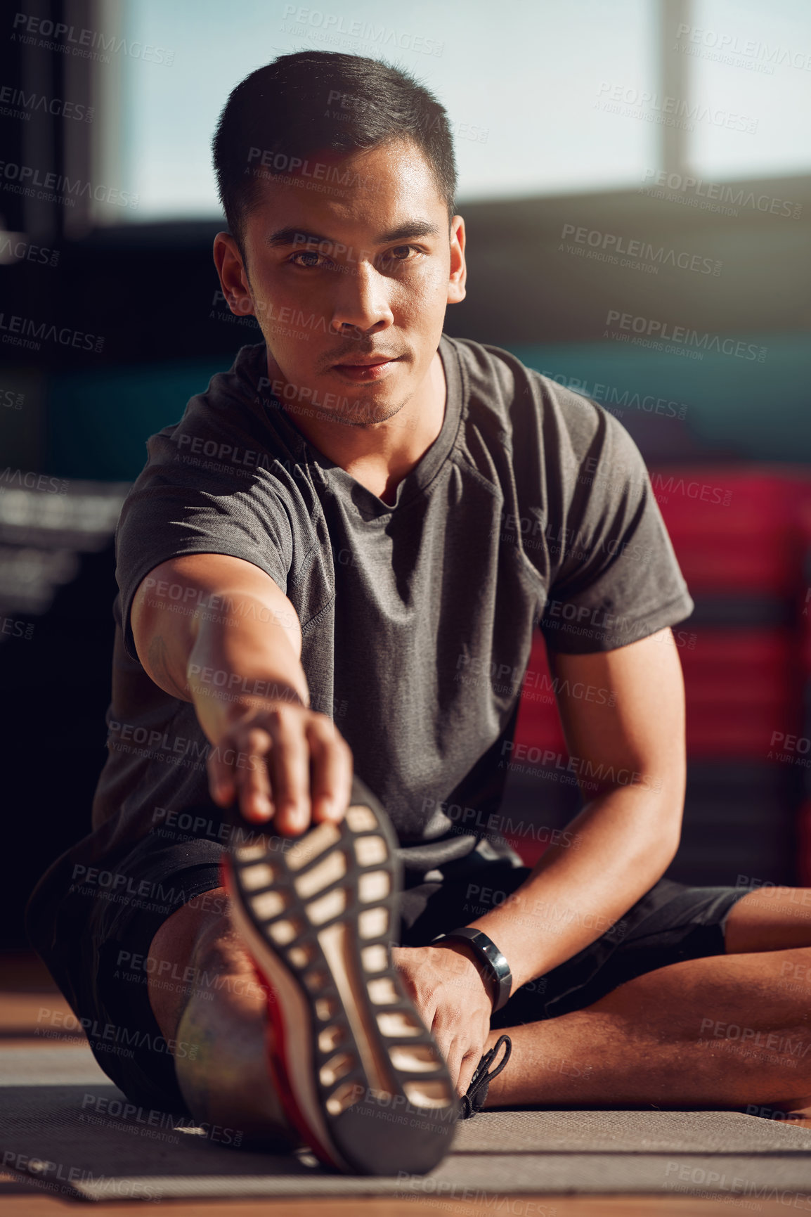 Buy stock photo Stretching, fitness and portrait of Asian man for workout, exercise and on yoga mat for sport. Warm up, person and athlete on floor ready at gym for wellness, training and healthy development