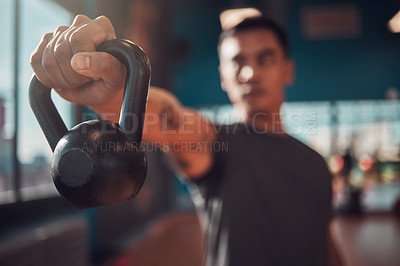 Buy stock photo Gym, fitness and man with kettlebell in hand for training, muscle development and endurance in studio. Bodybuilder, health club and equipment with weight for strength, balance workout and exercise