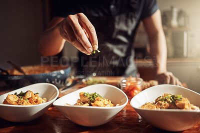 Buy stock photo Shot of an unrecognisable man preparing a delicious meal at home