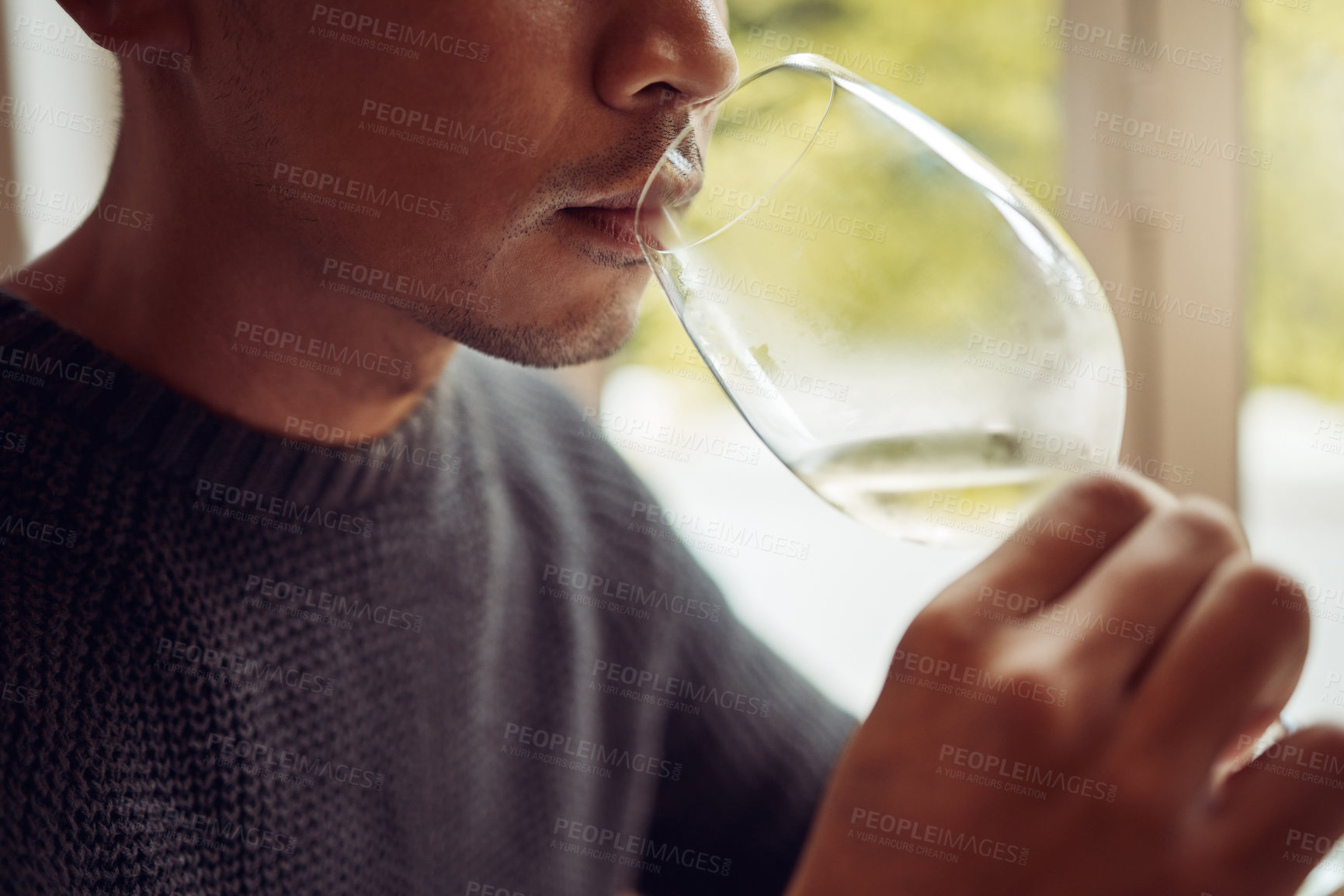 Buy stock photo Shot of a young man out wine tasting