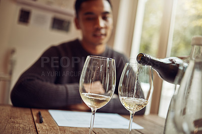 Buy stock photo Wine glasses, alcohol and man at vineyard restaurant for tasting, celebration or party for dining. Winery, bottle and male person with luxury alcohol champagne by table for dinner, banquet or event.