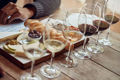 Buy stock photo Wine tasting, cheese board and winery restaurant with alcohol and glass for customer. Eating, drink and person with rich wines and food pairing in a fine dining and luxury snack experience alone