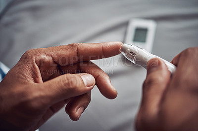 Buy stock photo Person, hand and blood sugar with finger for diabetes test or monitor insulin, glucometer or home. Medical, pen and checking as healthy measure or genetic problem with wellness, diagnostic or device
