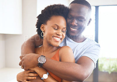 Buy stock photo African couple, happy and hug for bonding at home for celebration of new apartment for real estate investment. Smile, married people and support with love embrace for commitment and opportunity