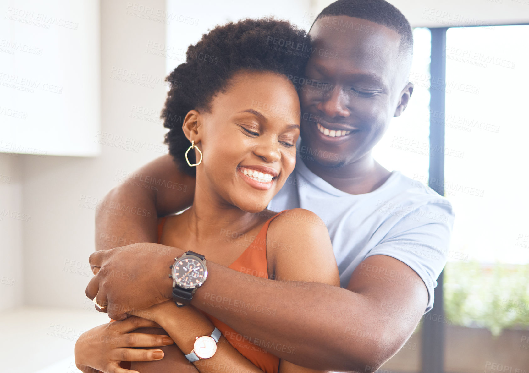 Buy stock photo African couple, happy and hug for bonding at home for celebration of new apartment for real estate investment. Smile, married people and support with love embrace for commitment and opportunity