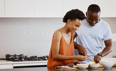 Buy stock photo Food, love and black couple in a kitchen for cooking, meal and bonding in their home together. Nutrition, lunch and happy woman with man preparing fresh, healthy and vegan salad recipe in their house