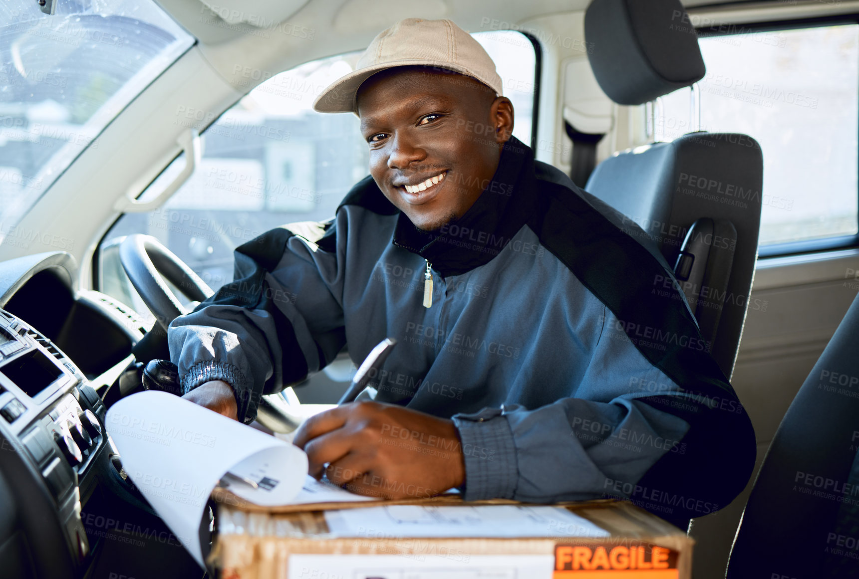 Buy stock photo Black man, portrait and writing in car delivery, box or package in logistics, shipping or transportation. Happy African male person or courier with smile filling form or cargo application in transit