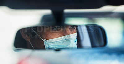 Buy stock photo Man, driving and face mask in rear view mirror for contagious infection, reflection or disease. Male person, car and mobile vaccination in drive thru for healthcare safety or sick, epidemic or virus