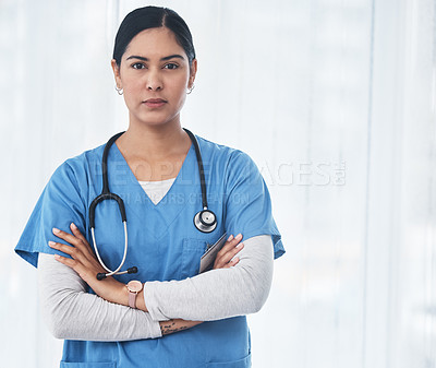 Buy stock photo Shot of a medical practitioner standing with her arms crossed