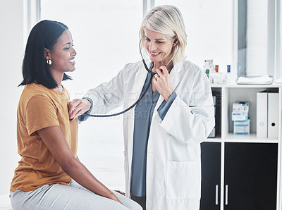 Buy stock photo Woman, doctor and stethoscope with consultation, heart condition and conversation for treatment, checkup or diagnosis. Female person, patient or medical professional with cardiology and examination