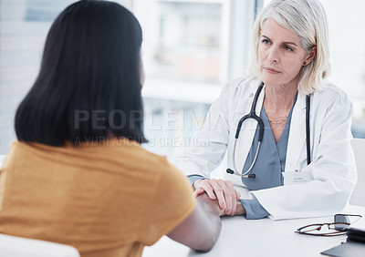 Buy stock photo Empathy, compassion and holding hands of doctor and patient for medical, trust and advice. Medicine, healthcare and help with women in hospital consulting room for depression, support and hope
