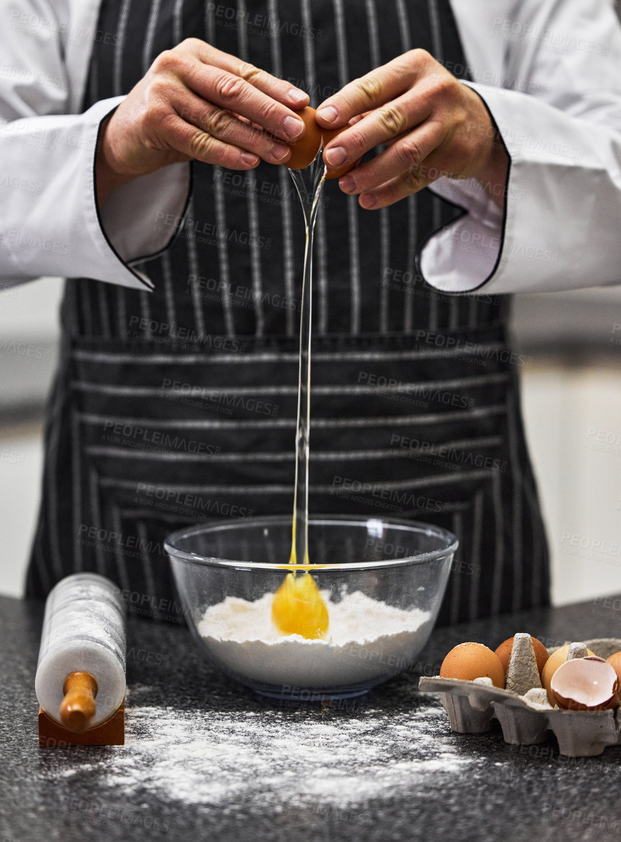 Buy stock photo Shot of an unrecognisable man preparing freshly made pasta