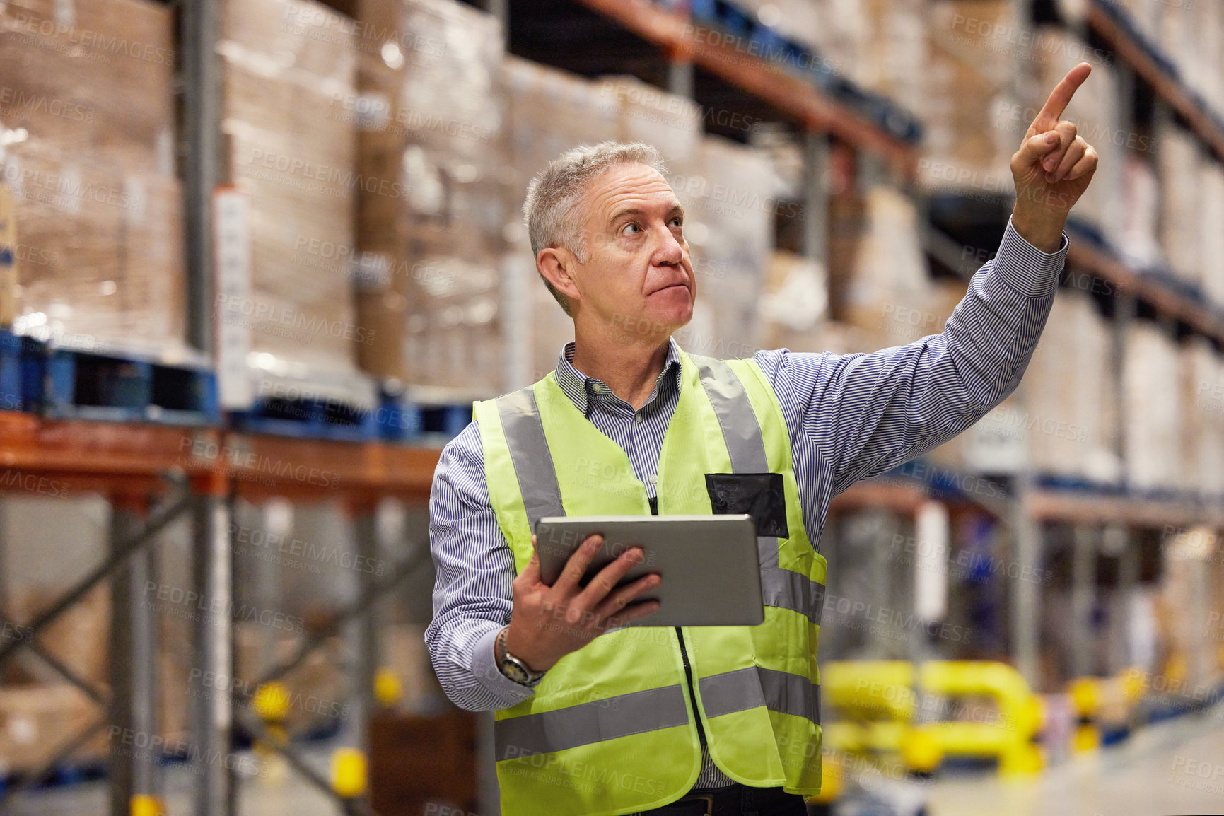 Buy stock photo Man, warehouse and worker with tablet pointing, technology and ecommerce for import or export. Inventory, online and shipping oder in manufacturing company, supply chain with distribution employee