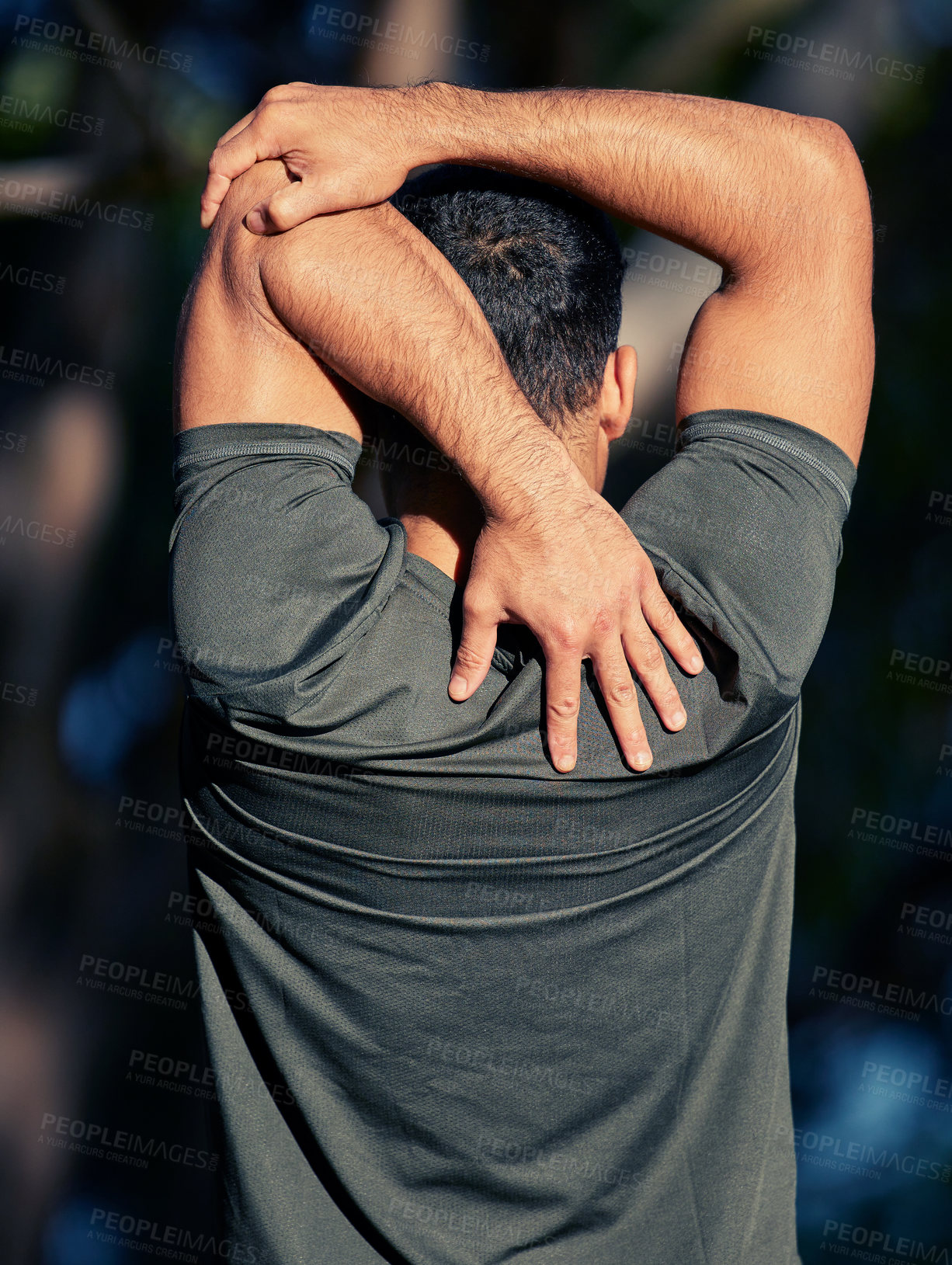 Buy stock photo Fitness, arm and man stretching for warm up before workout or morning training routine for race or wellness. Person, back view and outdoor with exercise for marathon or health, cardio and sports.