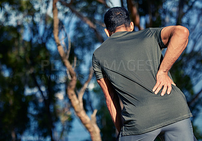 Buy stock photo Man, back pain and fitness injury in nature after accident, exercise or sports workout at night. Spine, problem or male athlete with arthritis, fibromyalgia or emergency, muscle wound or osteoporosis