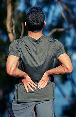 Buy stock photo Man, back pain and fitness injury outdoor after accident, exercise or sports workout. Spine, problem and male athlete with arthritis, fibromyalgia emergency or muscle inflammation for wound in forest