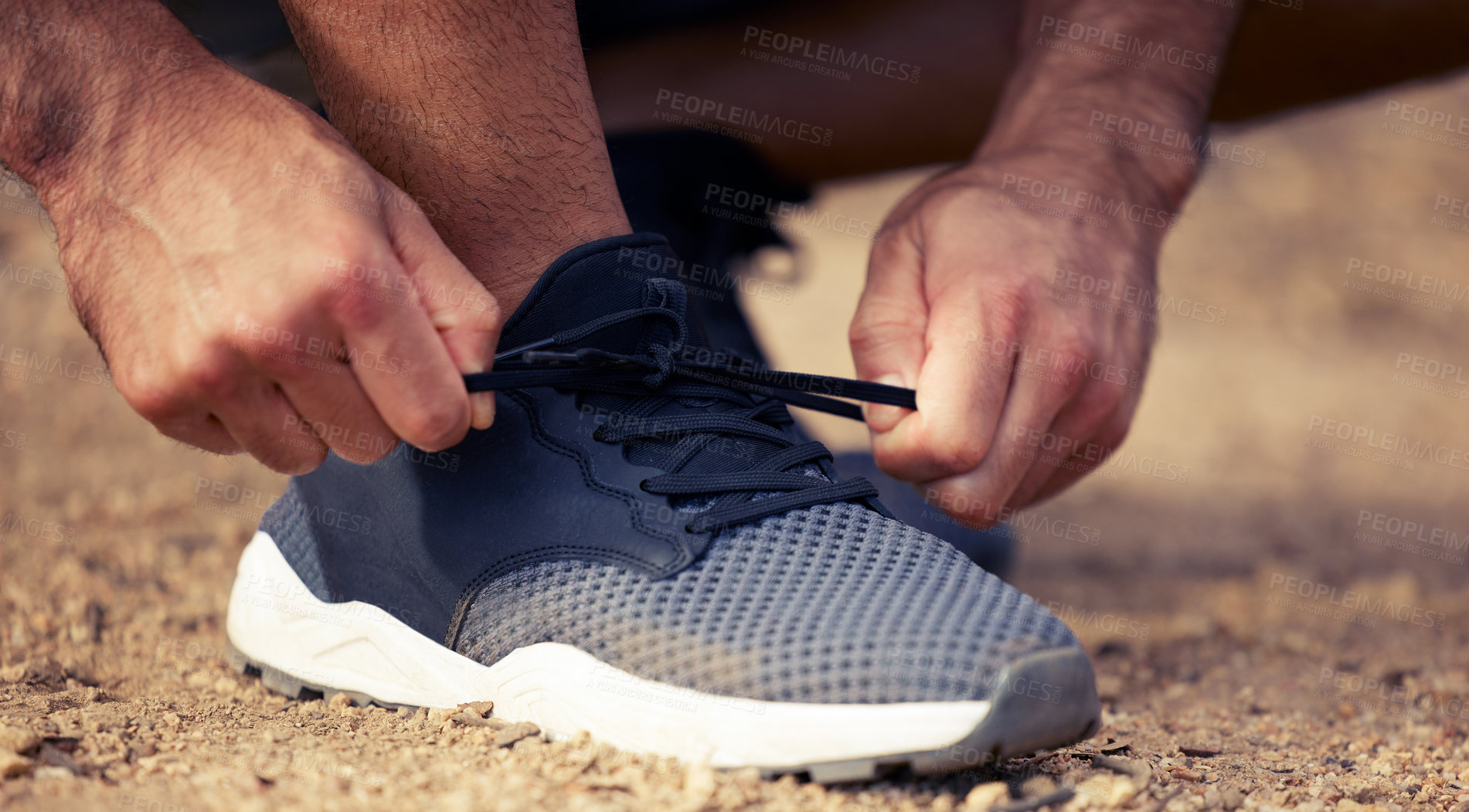 Buy stock photo Fitness, hands and runner tie shoes outdoor to start running, exercise or workout. Hand, athlete and man tying sneakers to get ready for cardio, training or exercising for sports, health and wellness