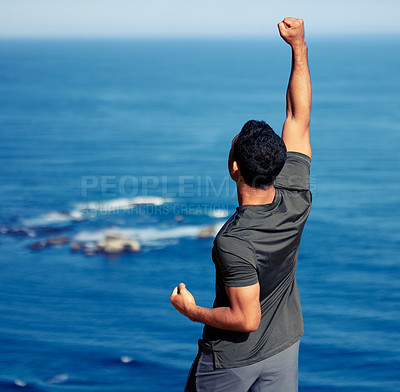 Buy stock photo Man, fitness and hiking celebration or hands with fist for exercise victory or outdoor view, back or workout. Male person, trekking and health goals at ocean or explore Australia, journey or travel
