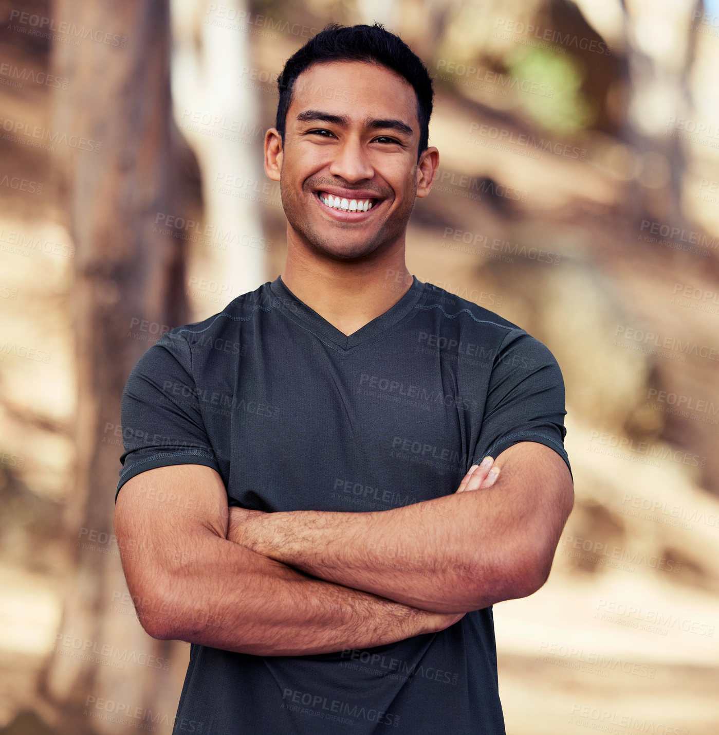 Buy stock photo Portrait of a sporty young man exercising outdoors