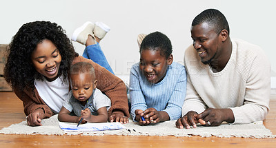 Buy stock photo Black family, home and living room drawing with smile, bonding and love with happiness. Mother, father and children with art, lounge and learning for fun and joy with kids for childhood memories