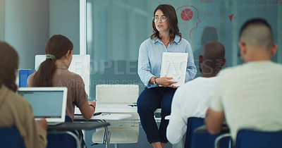 Buy stock photo Education, students college professor with documents in classroom for lecture, learning and explain lesson. University, educator and diverse classmates for taking notes, knowledge or communication