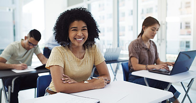 Buy stock photo Portrait of a happy young student among her classmates in a classroom at university