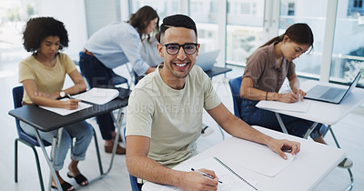 Buy stock photo Portrait of a happy young student among his classmates in a classroom at university