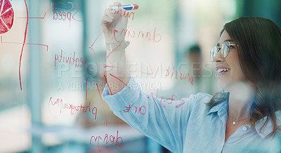 Buy stock photo Shot of a professor making notes for her students at university