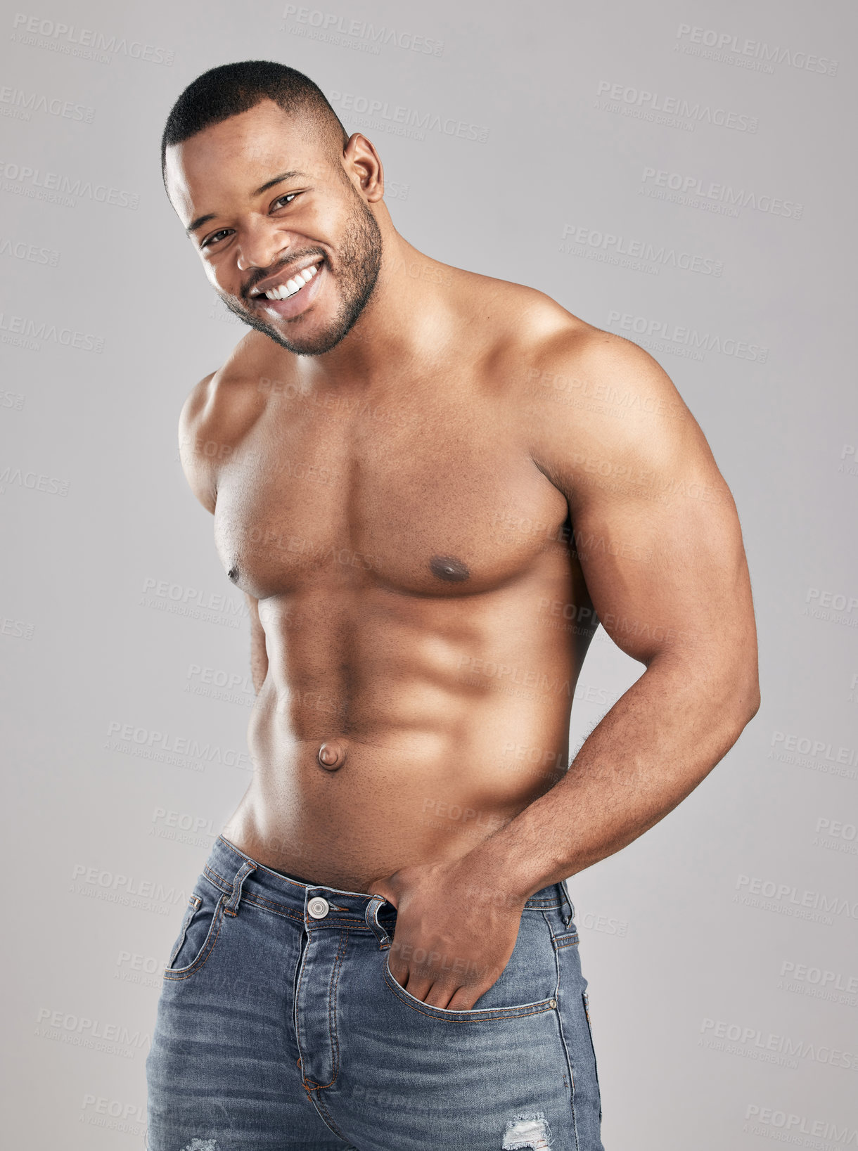 Buy stock photo Portrait, muscle and happy black man with abdomen for fitness, exercise or body health isolated on white studio background. Abs, shirtless and strong bodybuilder model in jeans for workout or fashion